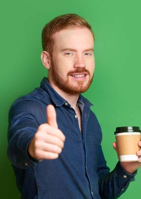 successful redhead young man isolated on green bac 2022 01 28 11 10 45 utc